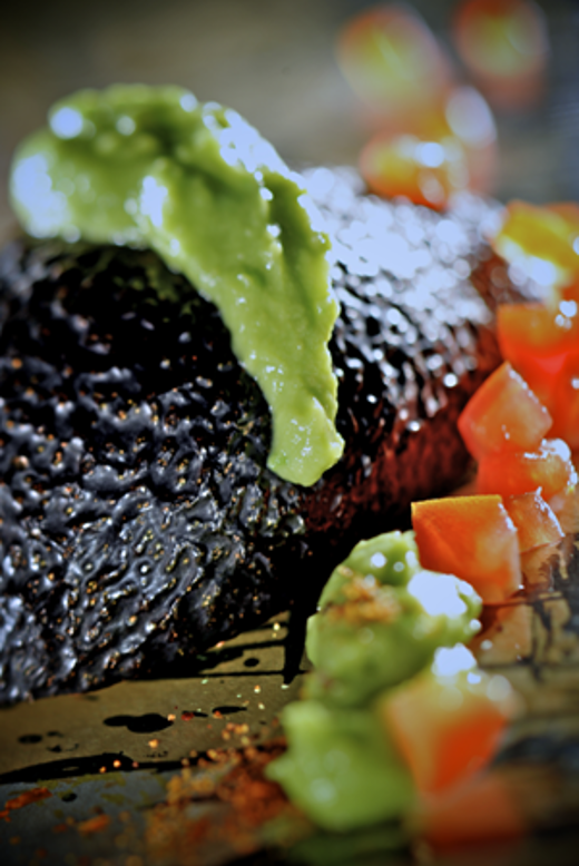 Avocadopuree met cajunkruiden en tomaat