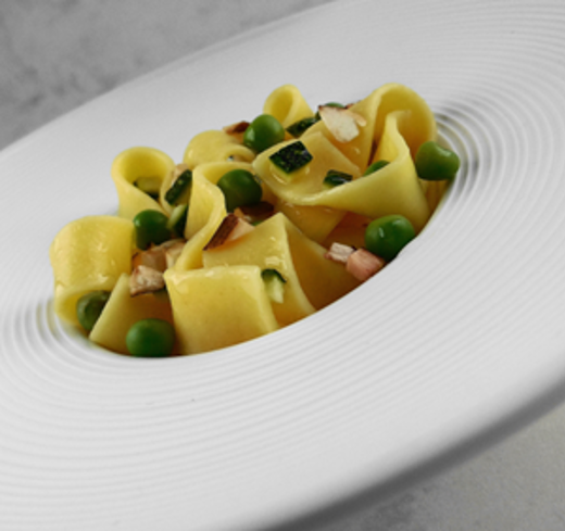 Tagliatelle met courgette, kastanjechampignons en doperwten