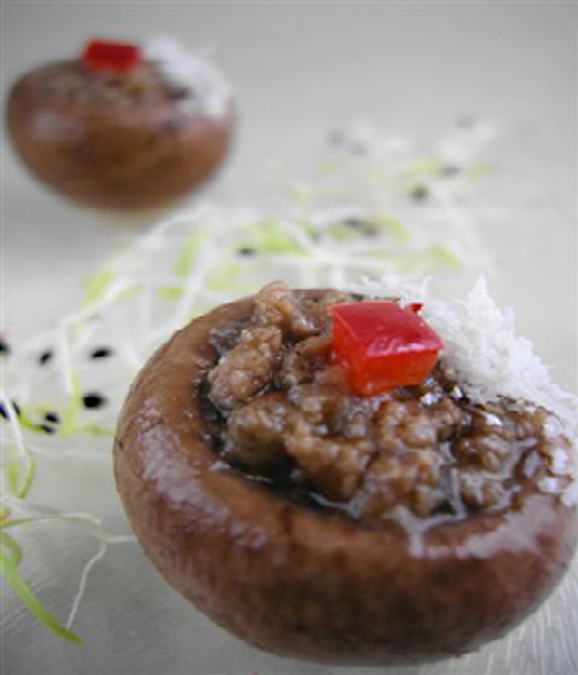 Kastanjechampignons gevuld met rundergehakt gestoofd in bier